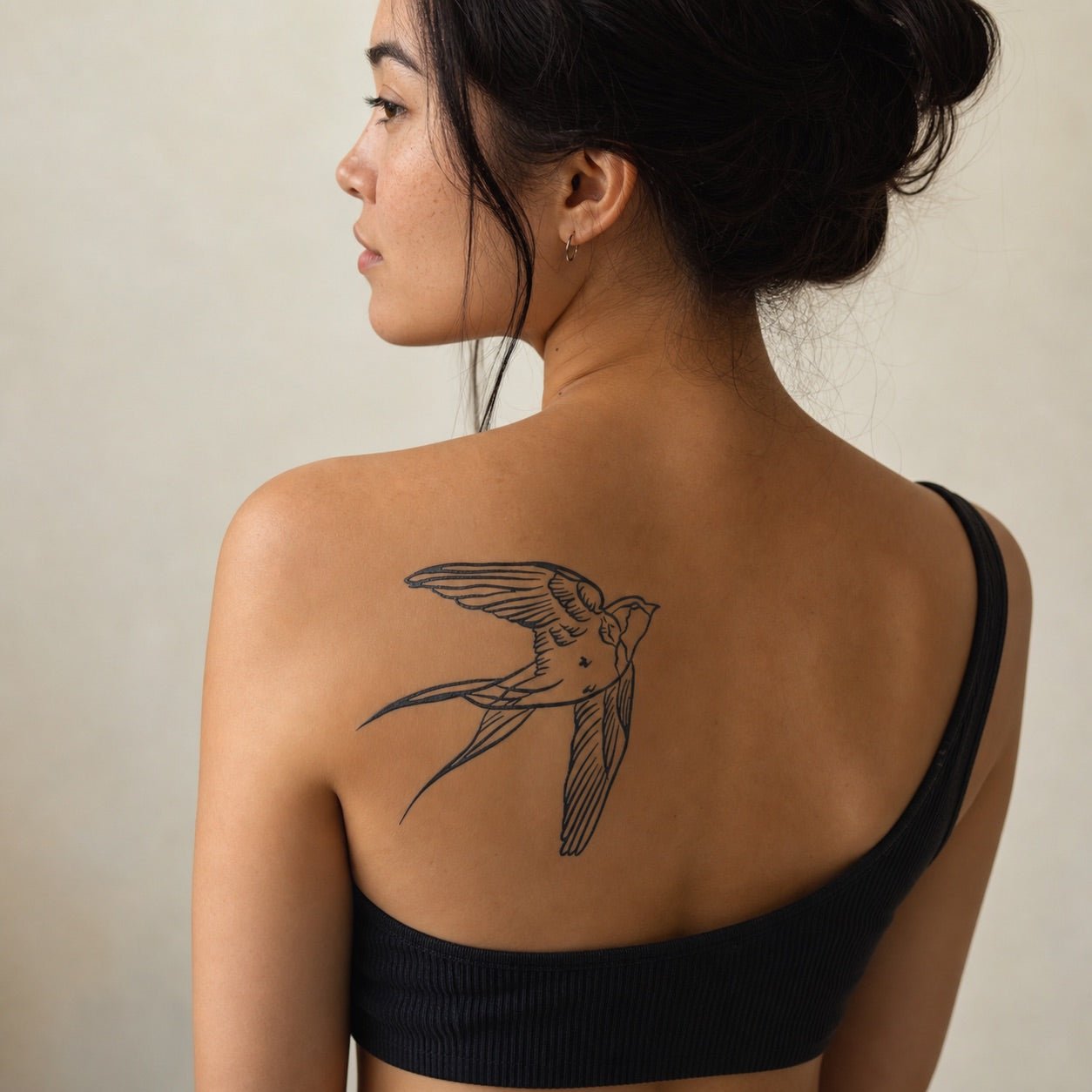 Classic Swallow Tattoo - 1 | Temporalis