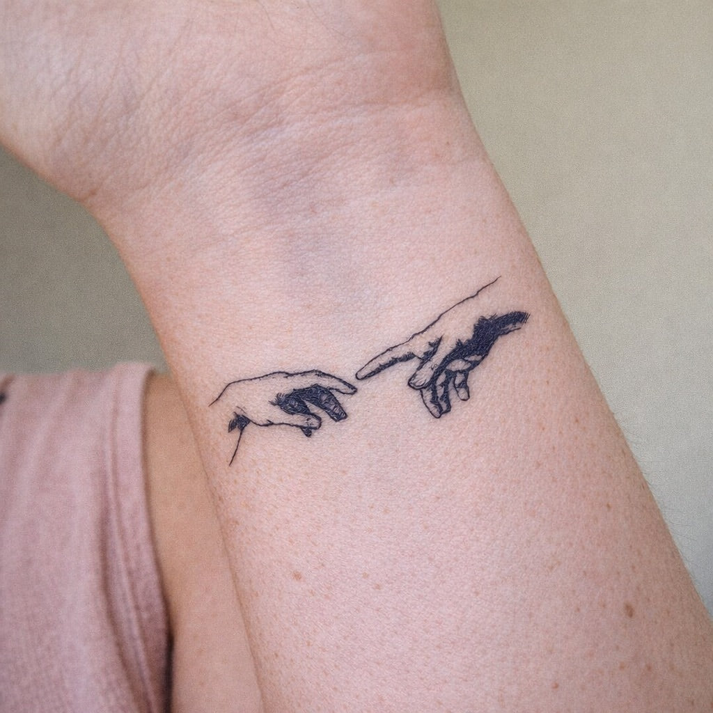 Creation of Adam Hands Tattoo - 1 | Temporalis