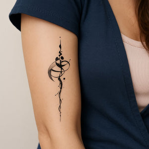 Vertical calligraphic flourish temporary tattoo with ink drops - 1 | Temporalis