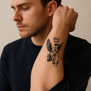 Blindfolded angel temporary tattoo with crown and wings - 1 | Temporalis