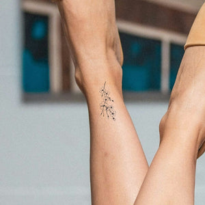 Fine line flower branch temporary tattoo with buds - 1 | Temporalis