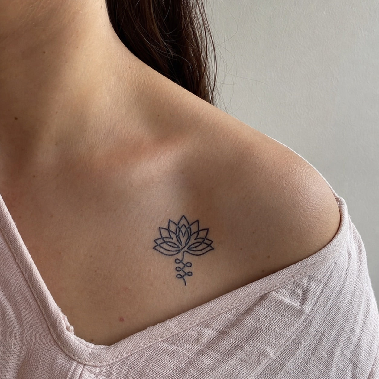 Fine line lotus flower temporary tattoo - 1 | Temporalis