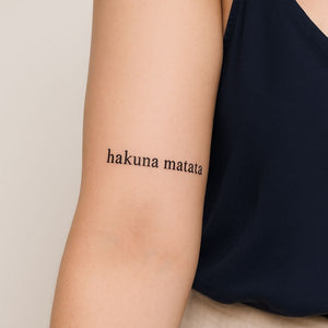 Hakuna Matata temporary tattoo in serif lettering - 1 | Temporalis