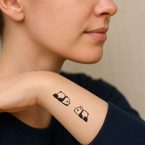 Lying down panda duo temporary tattoo, one with bow - 1 | Temporalis
