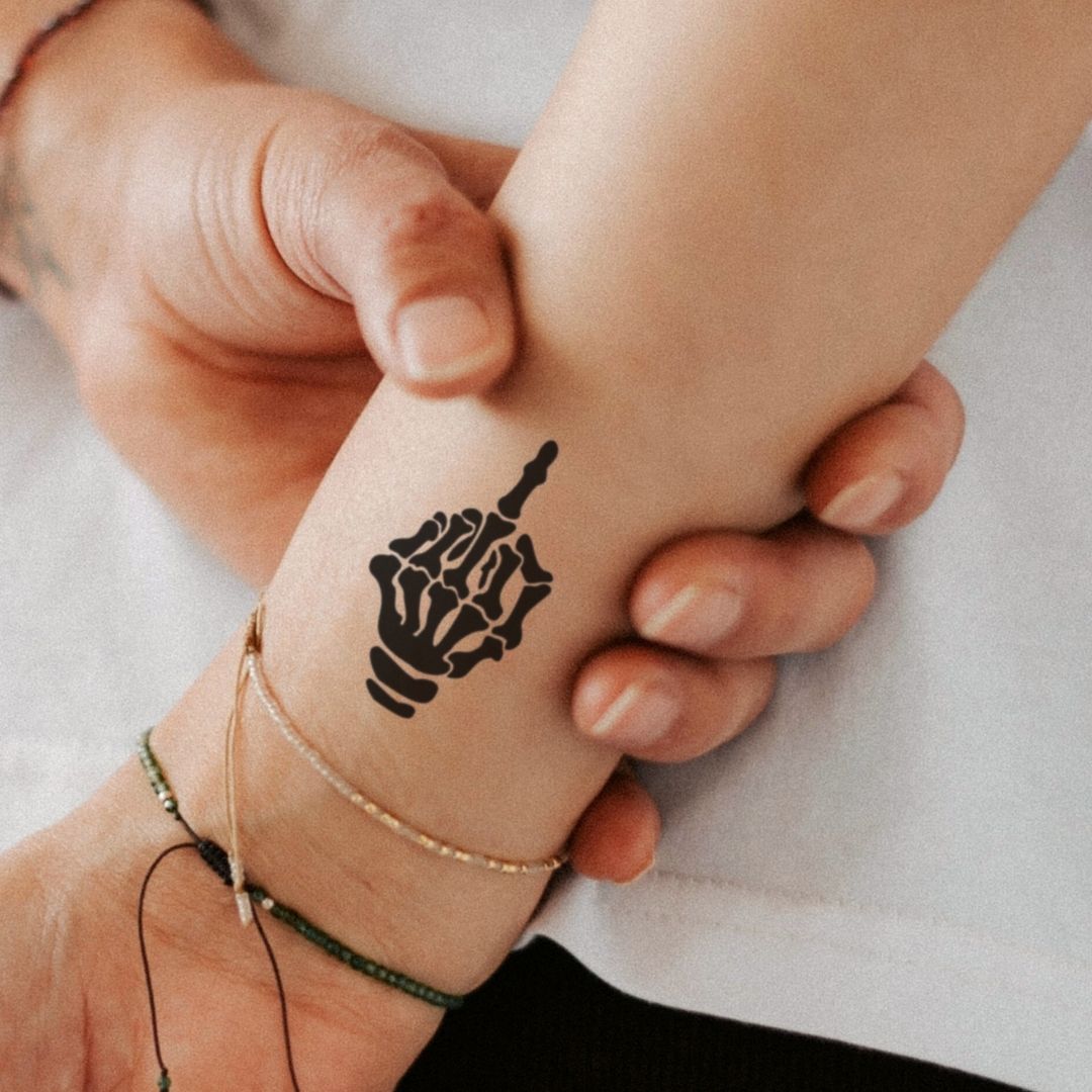 Skeleton hand middle finger temporary tattoo - 1 | Temporalis